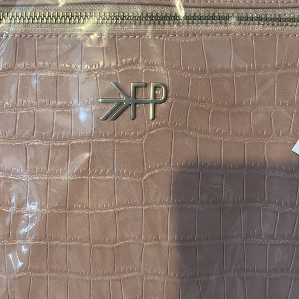 Minimal Water Resistant Faux Leather Diaper Backpack
FRESHLY PICKED - Picture 9 of 9